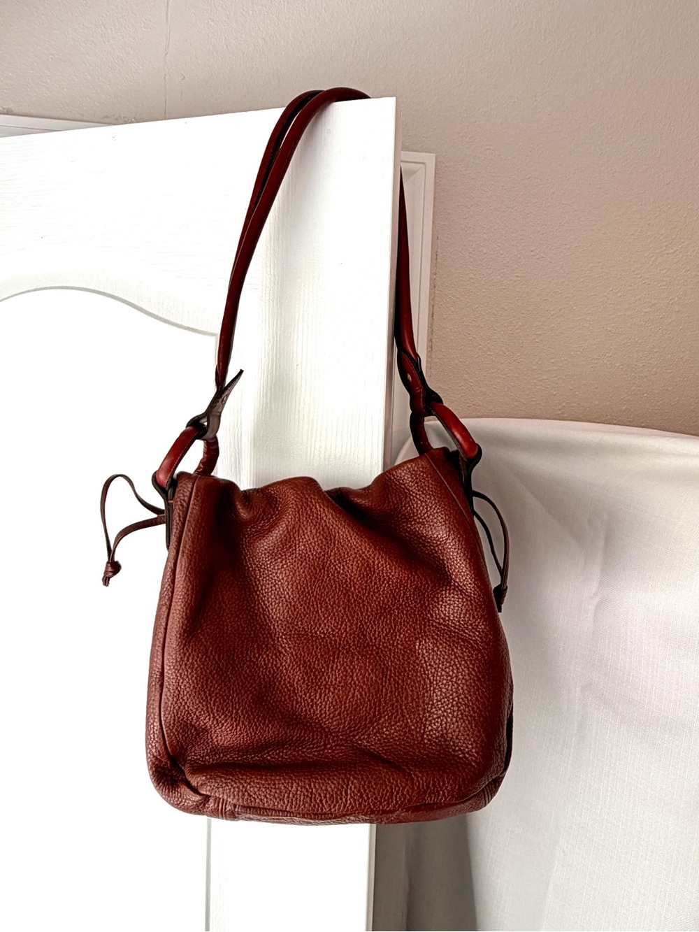 The Territory Ahead Unique Pebbled Leather Drawstring Shoulder Bag Cognac Brown